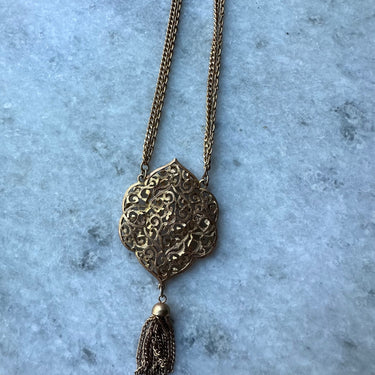 Gold Medallion With Tassle Pendant Bloomers and Frocks